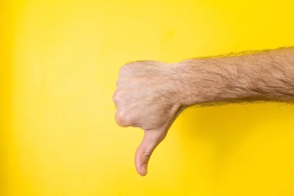 Χέρι κανένα σημάδι σε κίτρινο φόντο — Φωτογραφία Αρχείου