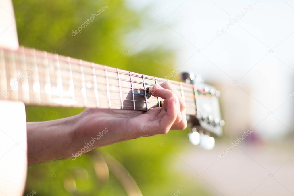 playing guitar in nature