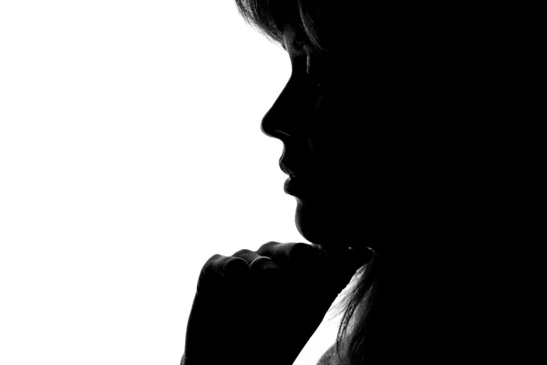 Silhouette of a woman's face on a white background — Stock Photo, Image