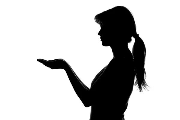 Silueta de una figura femenina sobre un fondo blanco — Foto de Stock
