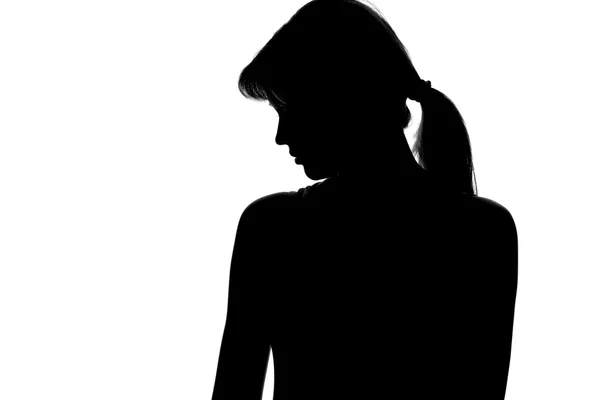 Silhouette einer nachdenklichen Frau auf weißem Hintergrund — Stockfoto