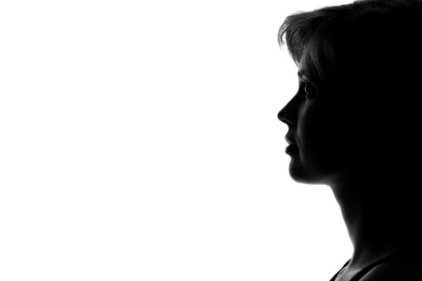 Silhouette of a woman's face on a white background — Stock Photo, Image