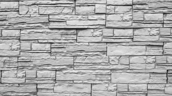 Texture home wall decoration made of natural stone. Brick wall background. Copy space add text. Stone texture background. Stone for interior exterior decoration, industrial construction concept design