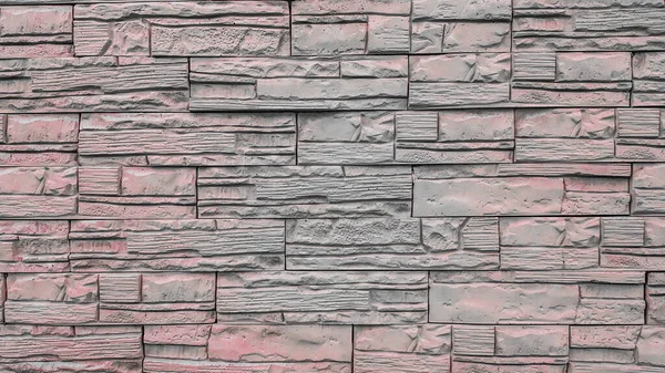 Texture home wall decoration made of natural stone. Brick wall background. Copy space add text. Stone texture background. Stone for interior exterior decoration, industrial construction concept design