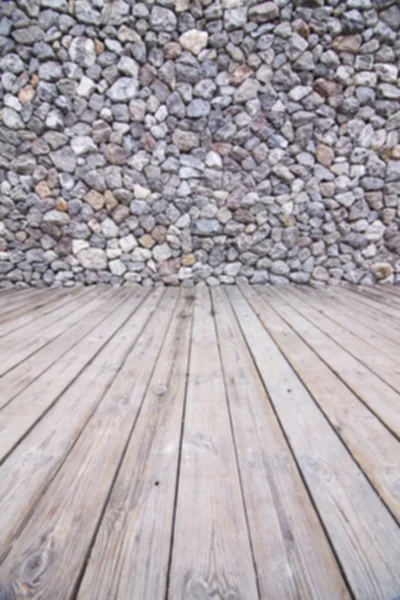 The rock walls and wooden floor. — Stock Photo, Image