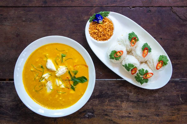 Coconut milk curry with crab and Fried crab in yellow curry. vegetable.