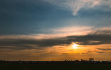 sunset over the city on the horizon 