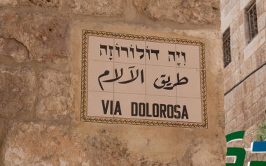 Street sign Via Dolorosa in Jerusalem, the holy path Jesus walked on his last day. Israel. High quality photo clipart