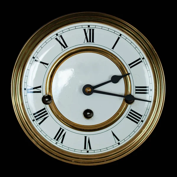 vintage wall clock dial. vintage clock close-up. antique clock on black background