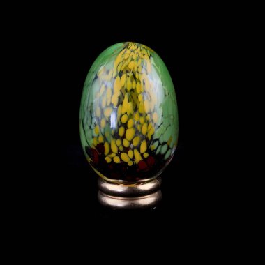 glass easter egg with colorful streaks