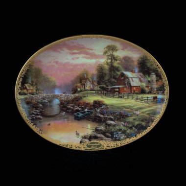 Manzaraları tasvir eden antika duvar levhası. Siyah izole arkaplana çizilmiş antika plaka el.