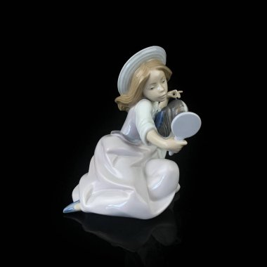 parcel statuette of a young girl. porcelain antique girl figurine