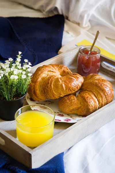 Breakfast food on the bed inside a bedroom — Stock Photo, Image