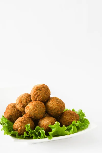 Vegetarian falafels and lettuce isolated on white background — Stock Photo, Image