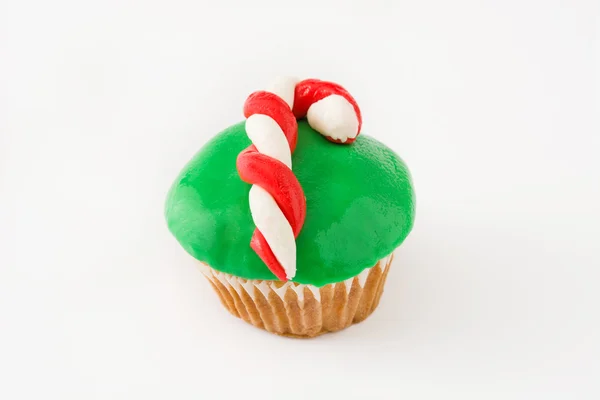 Cupcake de cana de Natal isolado no fundo branco — Fotografia de Stock