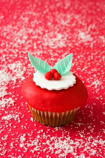 Christmas cupcakes on red background — Stock Photo, Image