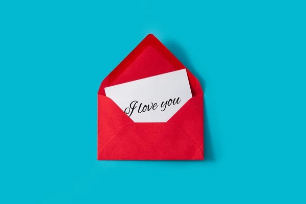 Заметка Сообщением Люблю Тебя Внутри Красной Эмблемы Синем Фоне — стоковое фото