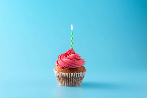 Pink Birthday Cupcake Green Candle Blue Background — Stock Photo, Image