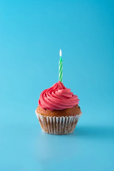 Pink Birthday Cupcake Green Candle Blue Background — Stock Photo, Image