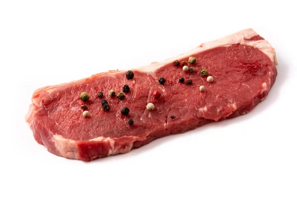 Rindersteak Garniert Mit Pfeffer Isoliert Auf Weißem Hintergrund — Stockfoto