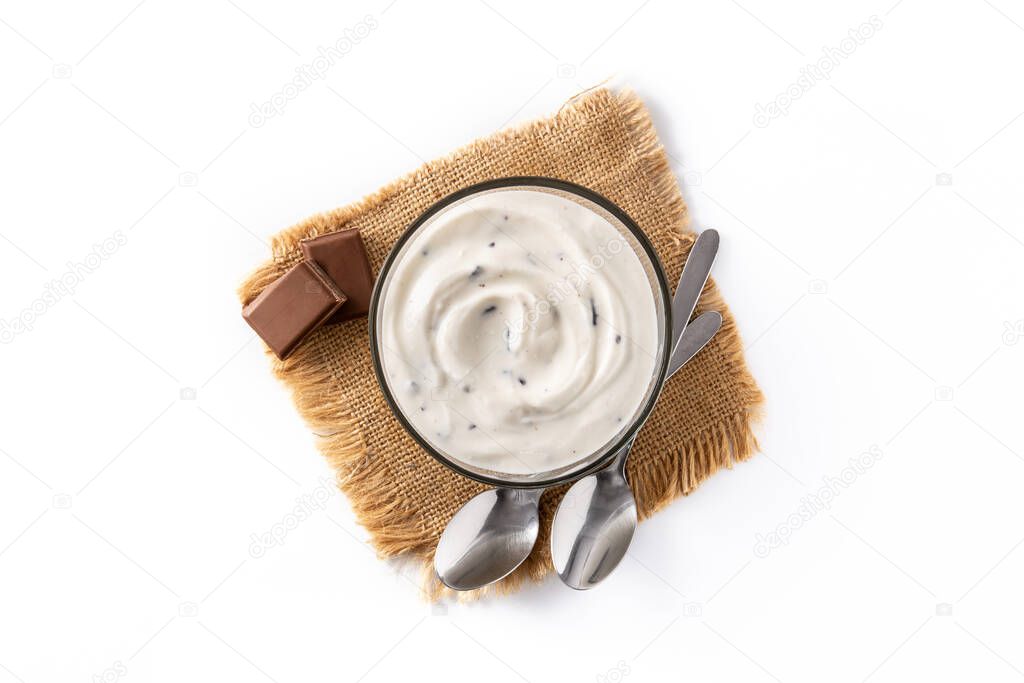Stracciatella yogurt in transparent bowl isolated on white background. Top view