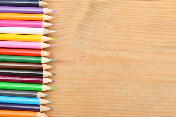 Colored pencils on wood Stock Image