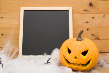 Cadılar Bayramı Balkabağı ile bir yazı tahtası