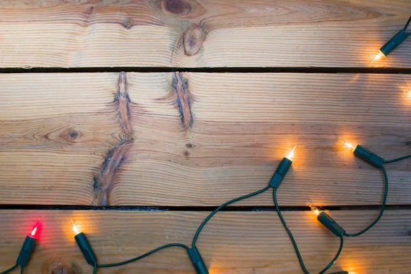 Weihnachtslicht auf Holz — Stockfoto