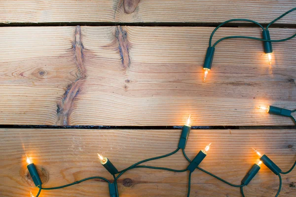 Weihnachtslicht auf Holz — Stockfoto