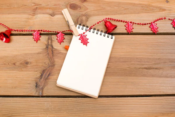 Notebook with Christmas bells — Stock Photo, Image