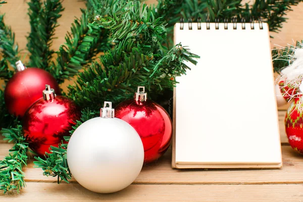 Christmas object and notebook — Stock Photo, Image