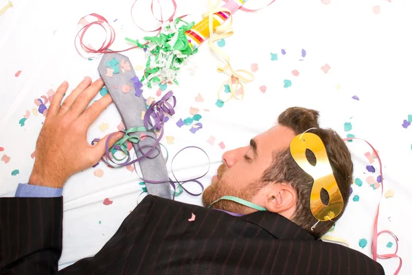 Young man sleeping after a party — Stock Photo, Image