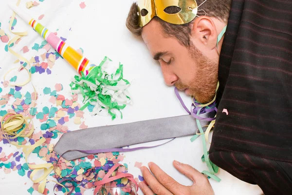 Young man sleeping after a party — Stock Photo, Image