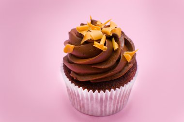 pembe bir arka plan üzerinde cupcake