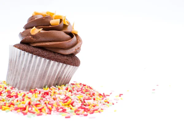 Cupcake och choklad strössel — Stockfoto