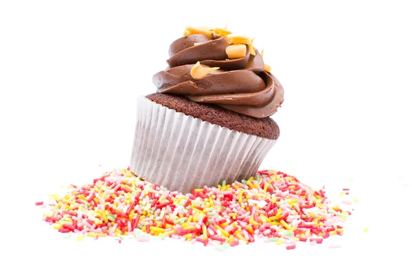 Sprinkles de chocolate e bolo — Fotografia de Stock