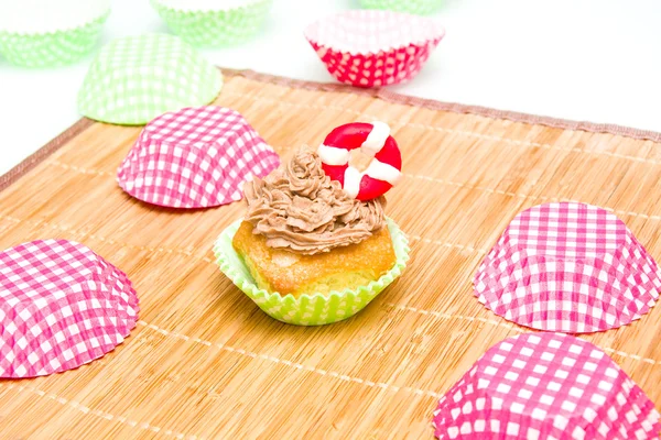 Summer cupcake with lifeguard float — Stock Photo, Image