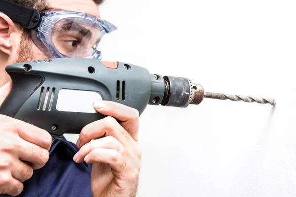 Man drilling — Stock Photo, Image