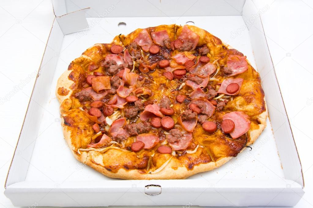 Pizza with BBQ sauce and sausage