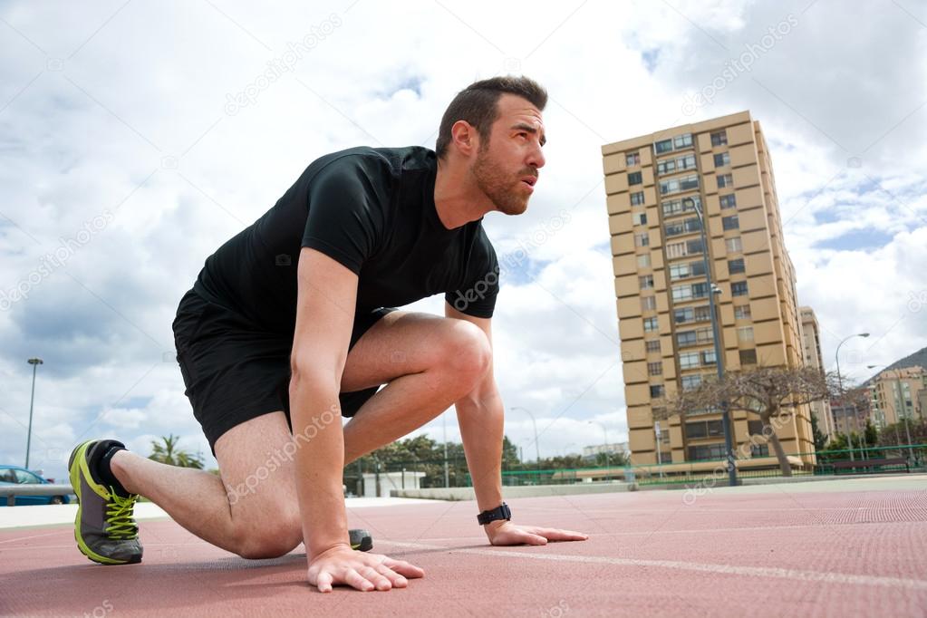 Man ready to run on the track