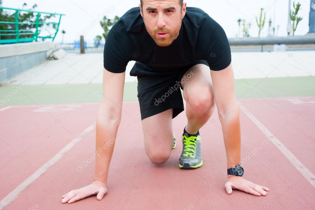 Man ready to run on the track
