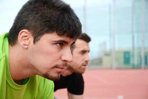 Runners at the start of the track — Stock Photo, Image