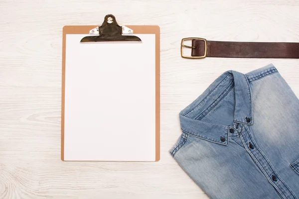 Jeans clothes on wood — Stock Photo, Image