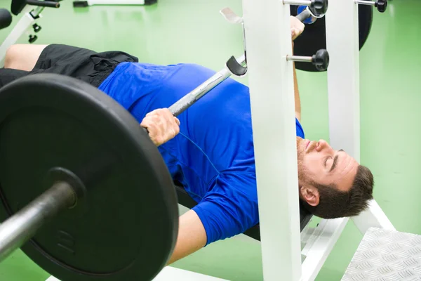 Man in gym — Stock Photo, Image