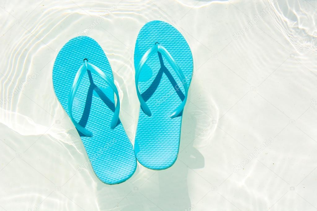 summer shoes in the swimming pool