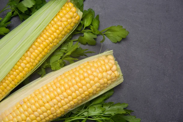 Corn on slate table — Stock Photo, Image