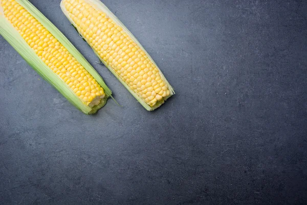 Corn on slate table — Stock Photo, Image