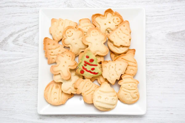 Weihnachtsplätzchen auf Holz — Stockfoto