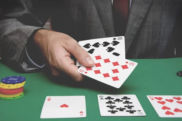 Man playing poker — Stock Photo, Image