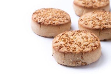 Traditional Spanish mantecados dessert or Christmas shortbread cookies isolated on white background